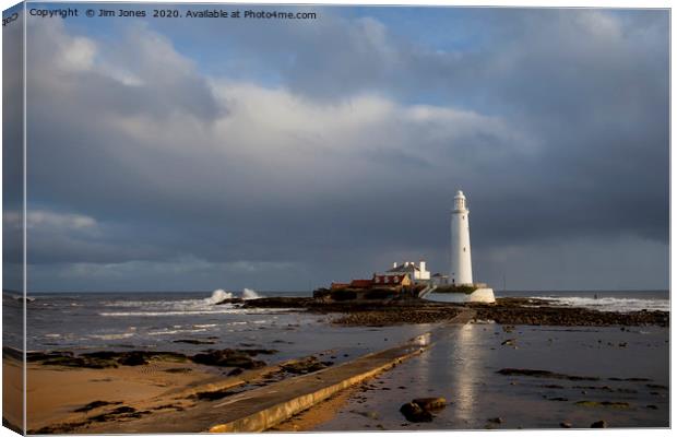 St Mary's Lighthouse lit up in sunshine Canvas Print by Jim Jones