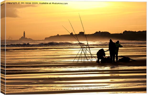 Fishermen on the beach at sunrise Canvas Print by Jim Jones