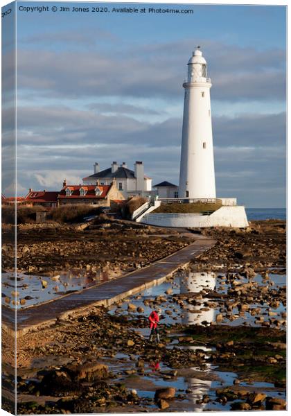 Looking for rock pools at St Mary's Island Canvas Print by Jim Jones