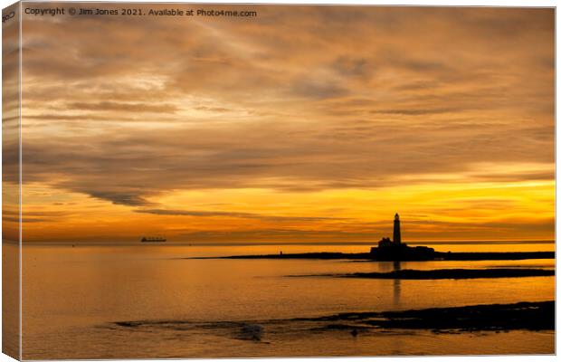 Silhouetted St Mary's Island at dawn Canvas Print by Jim Jones