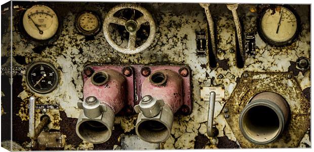 Rusting fire engine pump Canvas Print by Ian Jones