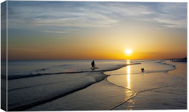 The shrimper and his dog Canvas Print by Ian Jones