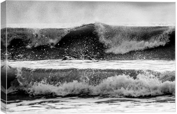 surfer paddling out Canvas Print by Ian Jones