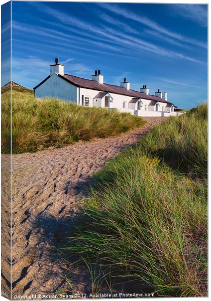 Pilots Cottages Llanddwyn Island Anglesey Canvas Print by Adrian Evans