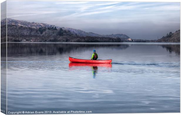 Red Canoe Llyn Padarn Llanberis  Canvas Print by Adrian Evans