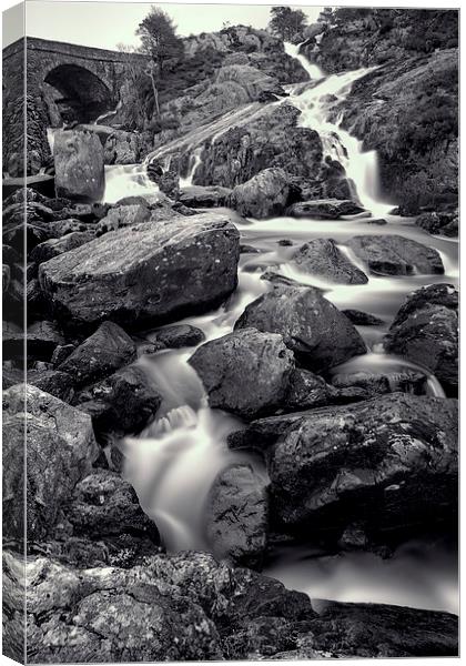 Ogwen Valley Bridge Snowdonia  Canvas Print by Adrian Evans