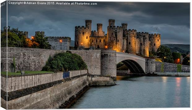 Conwy Castle by Lamplight Canvas Print by Adrian Evans