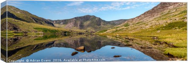 Ogwen Lake Snowdonia Reflections Canvas Print by Adrian Evans