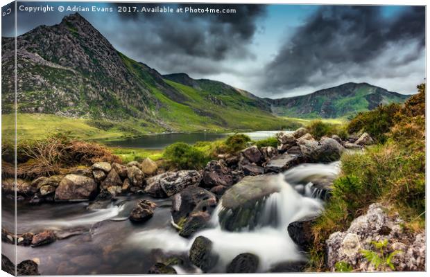 Tryfan and Ogwen Lake Canvas Print by Adrian Evans