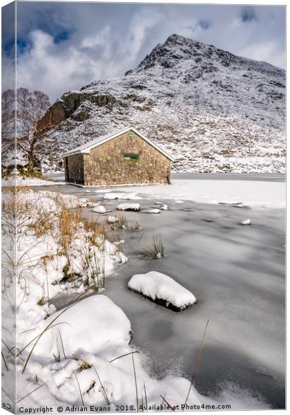 Frozen Ogwen Lake Snowdonia Canvas Print by Adrian Evans