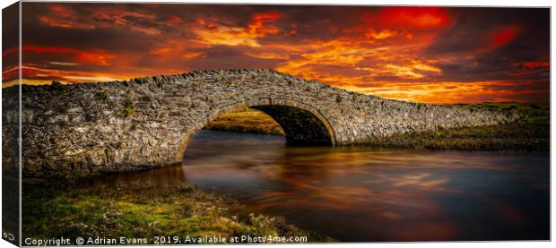 Aberffraw Bridge Sunset Canvas Print by Adrian Evans