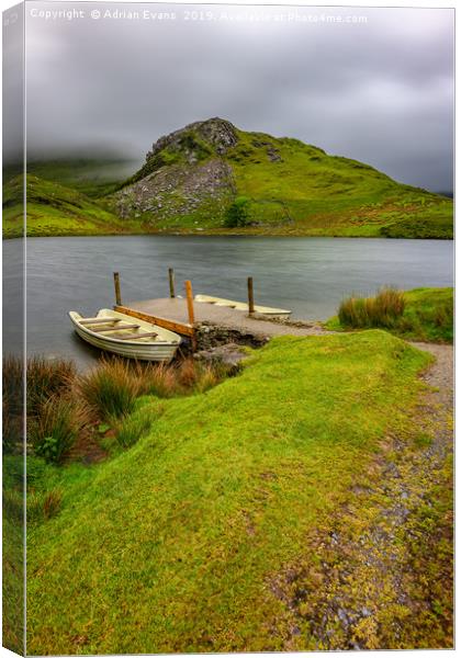 Llyn y Dywarchen Boats Snowdonia Canvas Print by Adrian Evans