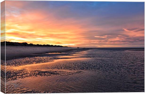 Sunset stroll on Wells beach Canvas Print by Gary Pearson