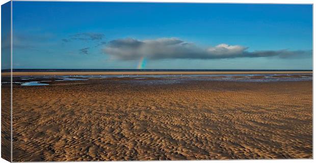 A rainbow across the sea Canvas Print by Gary Pearson