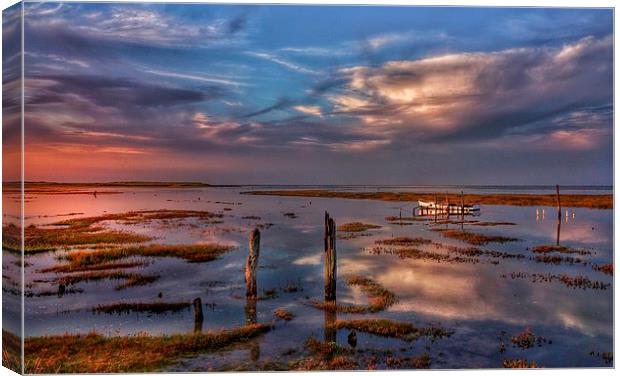 Thornham marsh sunset reflections Canvas Print by Gary Pearson