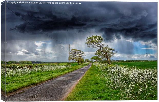 Storm clouds over Ringstead Canvas Print by Gary Pearson