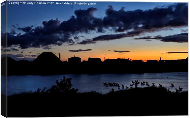  Sunset silhouette at Snettisham Canvas Print by Gary Pearson