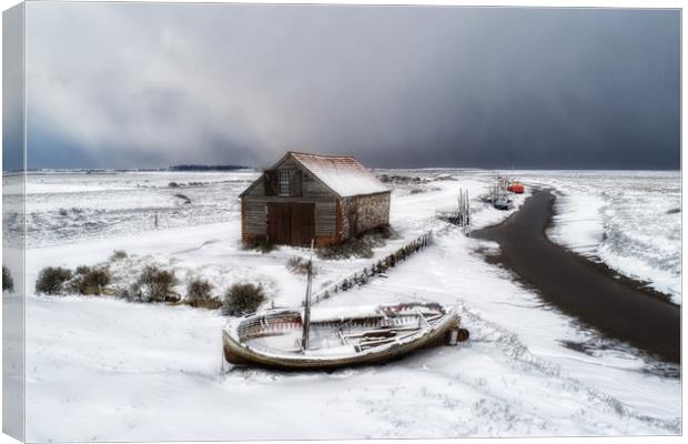 Snow around the old coal barn at Thornham  Canvas Print by Gary Pearson