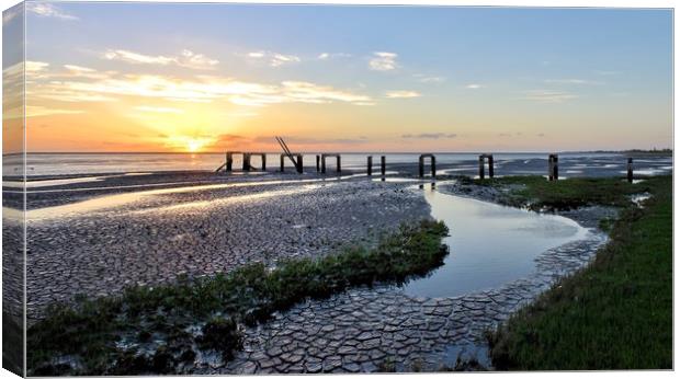 Sunset over the old jetty at Snettisham  Canvas Print by Gary Pearson