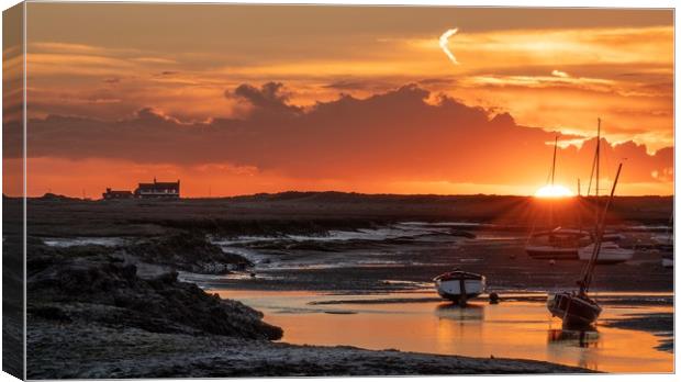 Sunset over Brancaster Staithe in Norfolk  Canvas Print by Gary Pearson