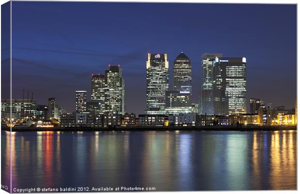 Canary Wharf financial district viewed over the ri Canvas Print by stefano baldini