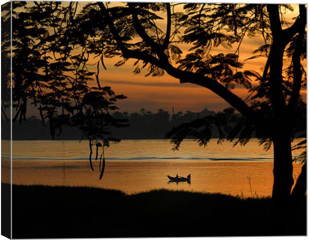 Fishing at sunset Canvas Print by David Worthington