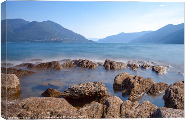 Lake with a mountain in the background Canvas Print by Kat Arul