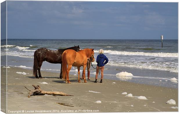 Horses onthe Beach Canvas Print by Louise Heusinkveld