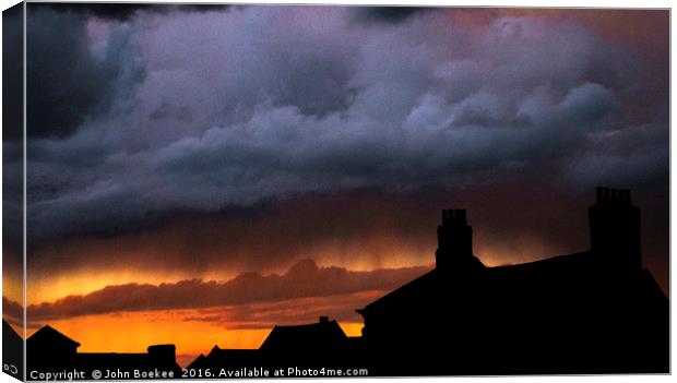 Storm over Norwich with sunset Canvas Print by John Boekee