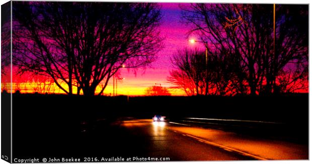 Sunrise on the way to work one morning Canvas Print by John Boekee