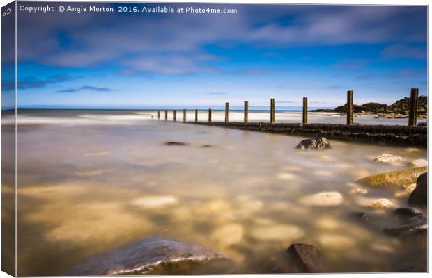 Seaham Beach in Clear Water Canvas Print by Angie Morton