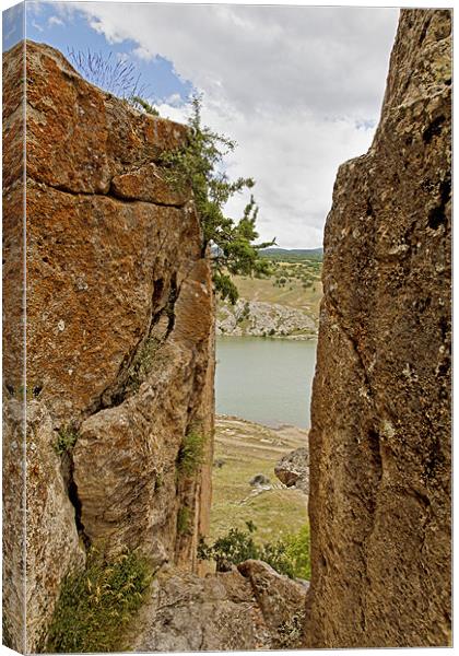 Tarn through the gorge Canvas Print by Arfabita  