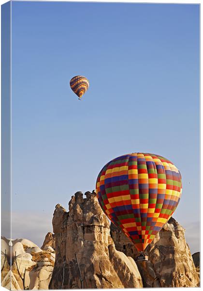 Hot air balloons on the rocks Canvas Print by Arfabita  