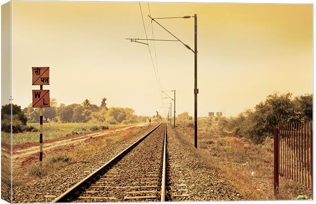 Indian Hinterland landscape with railroad track Canvas Print by Arfabita  