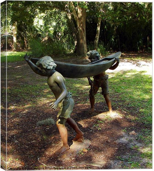 Bronze Boy and their canoe Canvas Print by Susan Medeiros