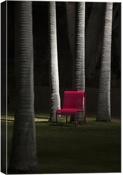 Red Chair in the Park Canvas Print by Panas Wiwatpanachat