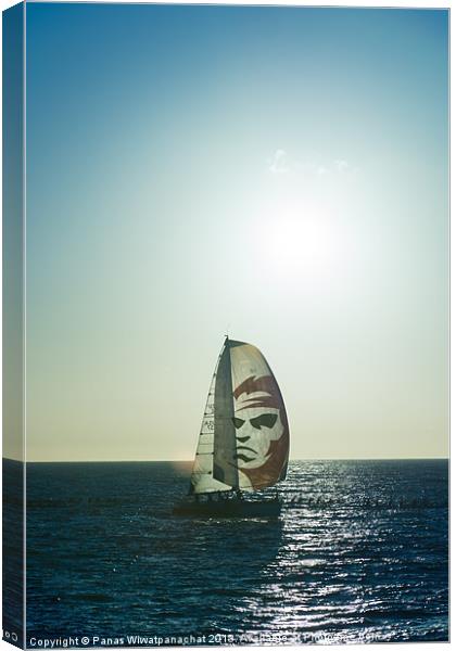 Sailing into the Sunset Canvas Print by Panas Wiwatpanachat
