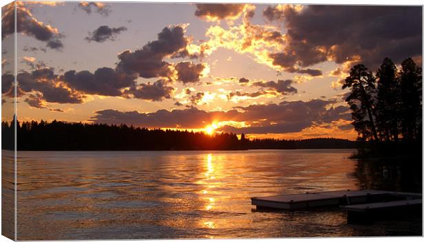 Montana Sunset over Blaine Lake Canvas Print by Ron Hartley