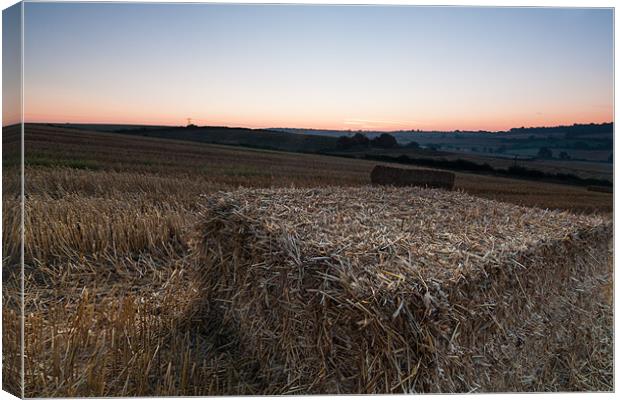 Hay Bale Sunrise Canvas Print by Jonathan Swetnam