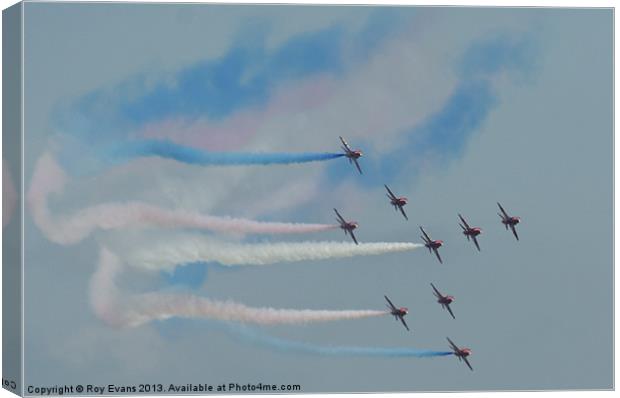 Red arrows flyby Canvas Print by Roy Evans