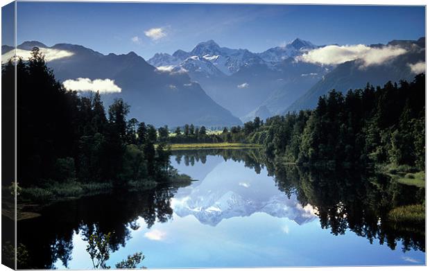 Lake Matheson Mountain Reflection Canvas Print by Ashley Chaplin