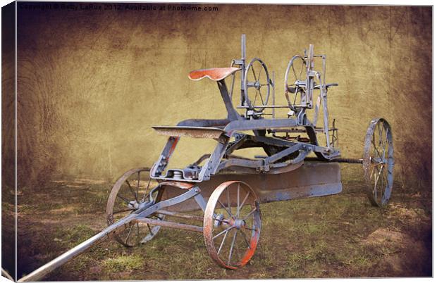 Antique Road Grader Canvas Print by Betty LaRue