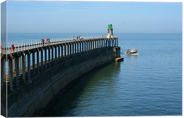 Whitby Pier Canvas Print by Claire Ungley