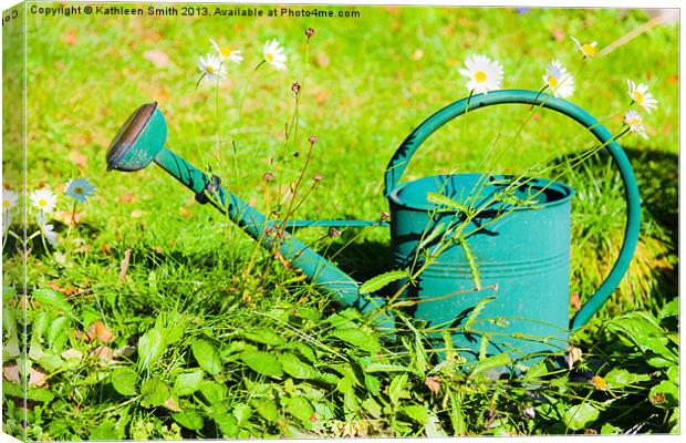 Green watering can and daisies Canvas Print by Kathleen Smith (kbhsphoto)