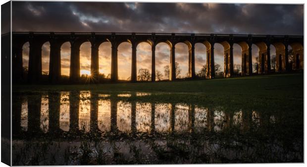 Flooded fields at sunset Canvas Print by Sue MacCallum- Stewart