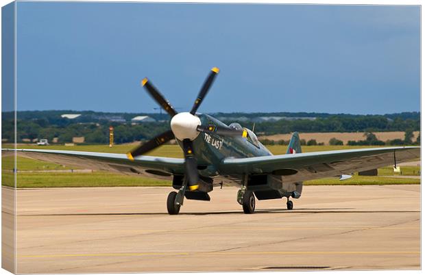 Vintage Spitfire Last of the Many Canvas Print by Phil Emmerson