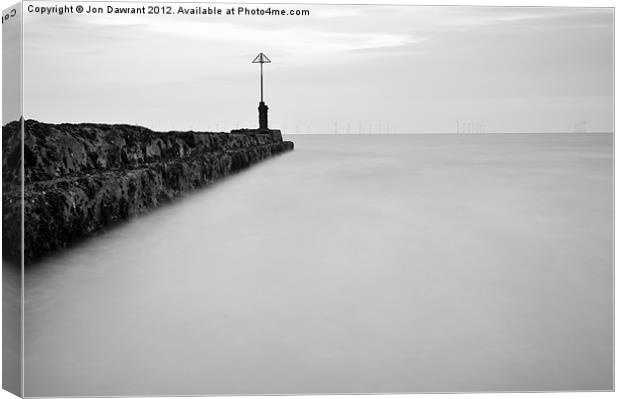 Long exposure of the the sea by a groyne Canvas Print by Jonny Essex