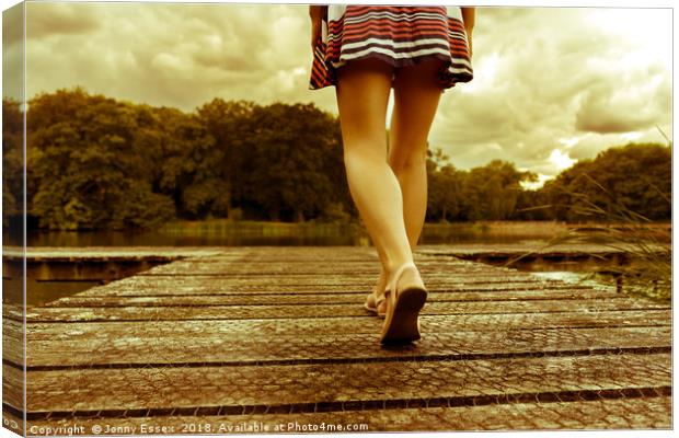 Lady with a perfect figure walking on a jetty Canvas Print by Jonny Essex
