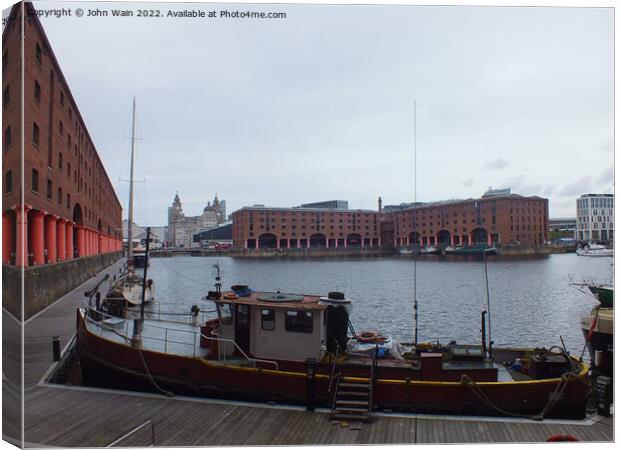 Royal Albert Dock And the 3 Graces Canvas Print by John Wain