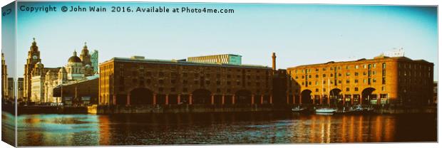 Royal Albert Dock and Three Graces Canvas Print by John Wain